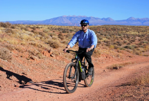 Former BLM Acting Director William Perry Pendley rides an e-bike