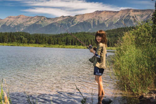 Girl fishing at lake